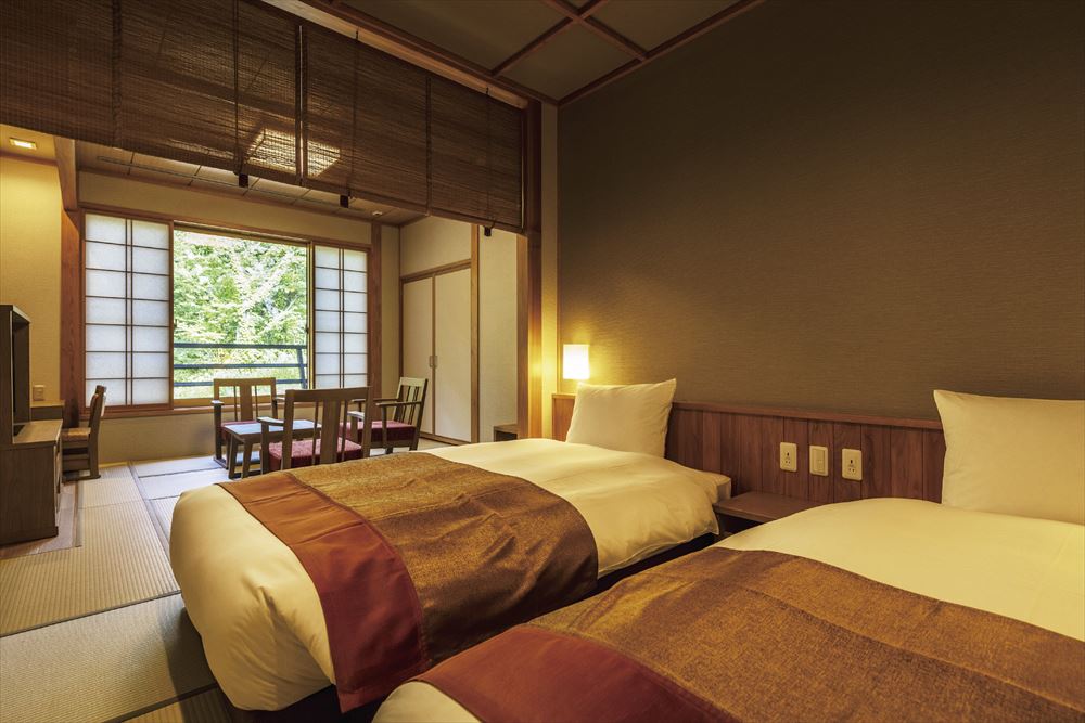 Yukemuri No Yado Inazumi Onsen_Japanese-Western style room. Equipped with an outdoor, natural hot spring bath.