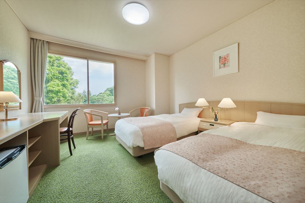 Osyu Akiu Spa RANTEI. The twin bed room provides a compact, well-appointed space.