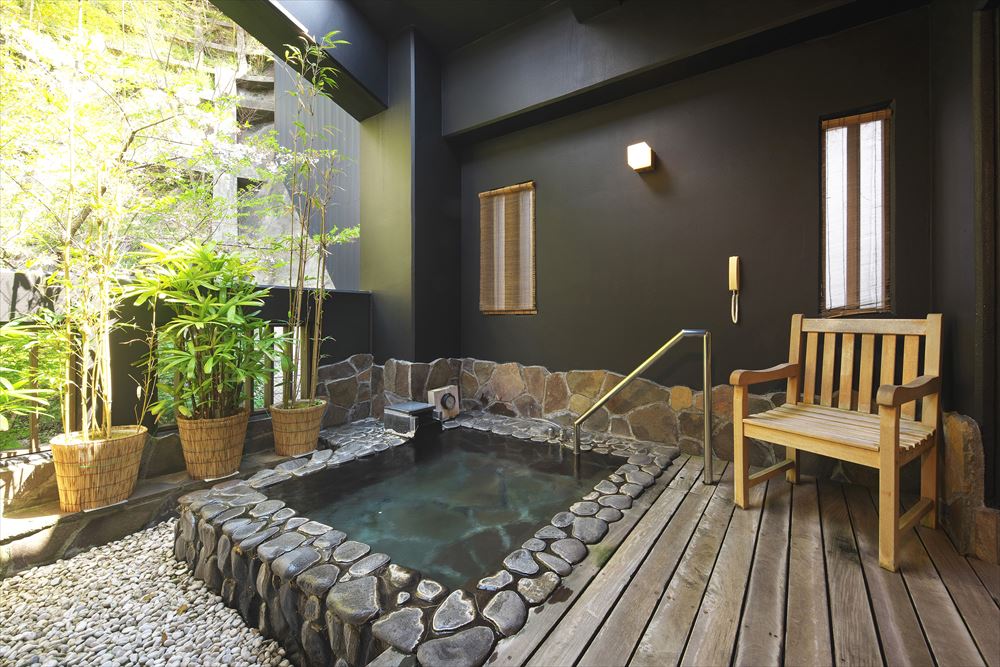 Onyado MEGUMI. Private open-air bath “Ginga”, with hot spring waters free-flowing from the source.